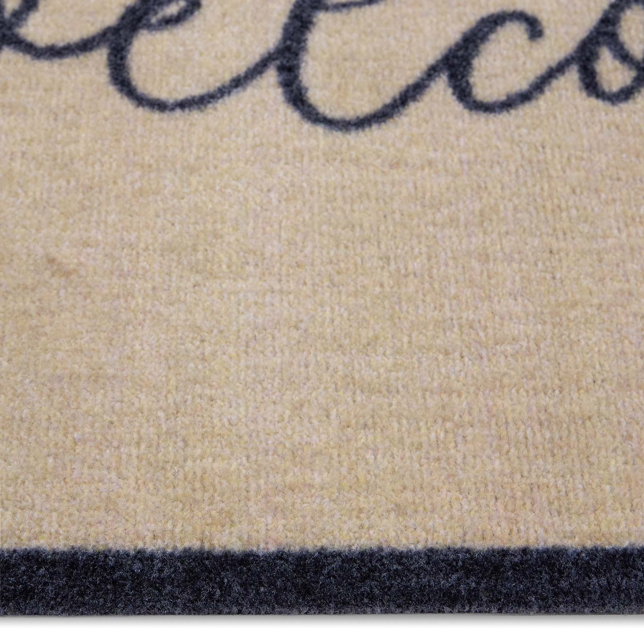 My Welcome Linear- 100% nylon doormat featuring the word 'welcome' against a cream background.