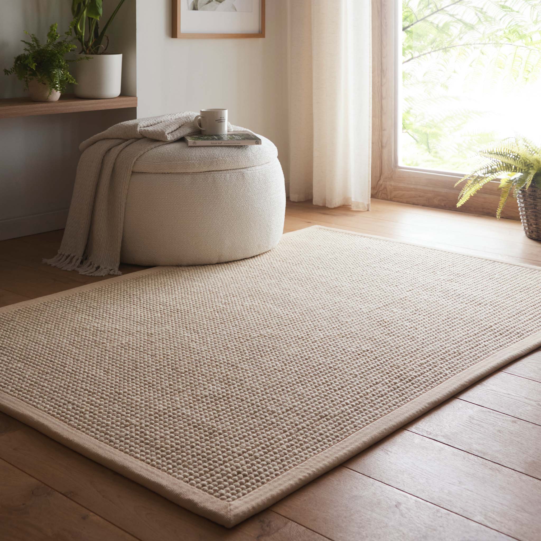Origins Sisal Boucle with Beige Border- a wool rug featuring a natural border.  