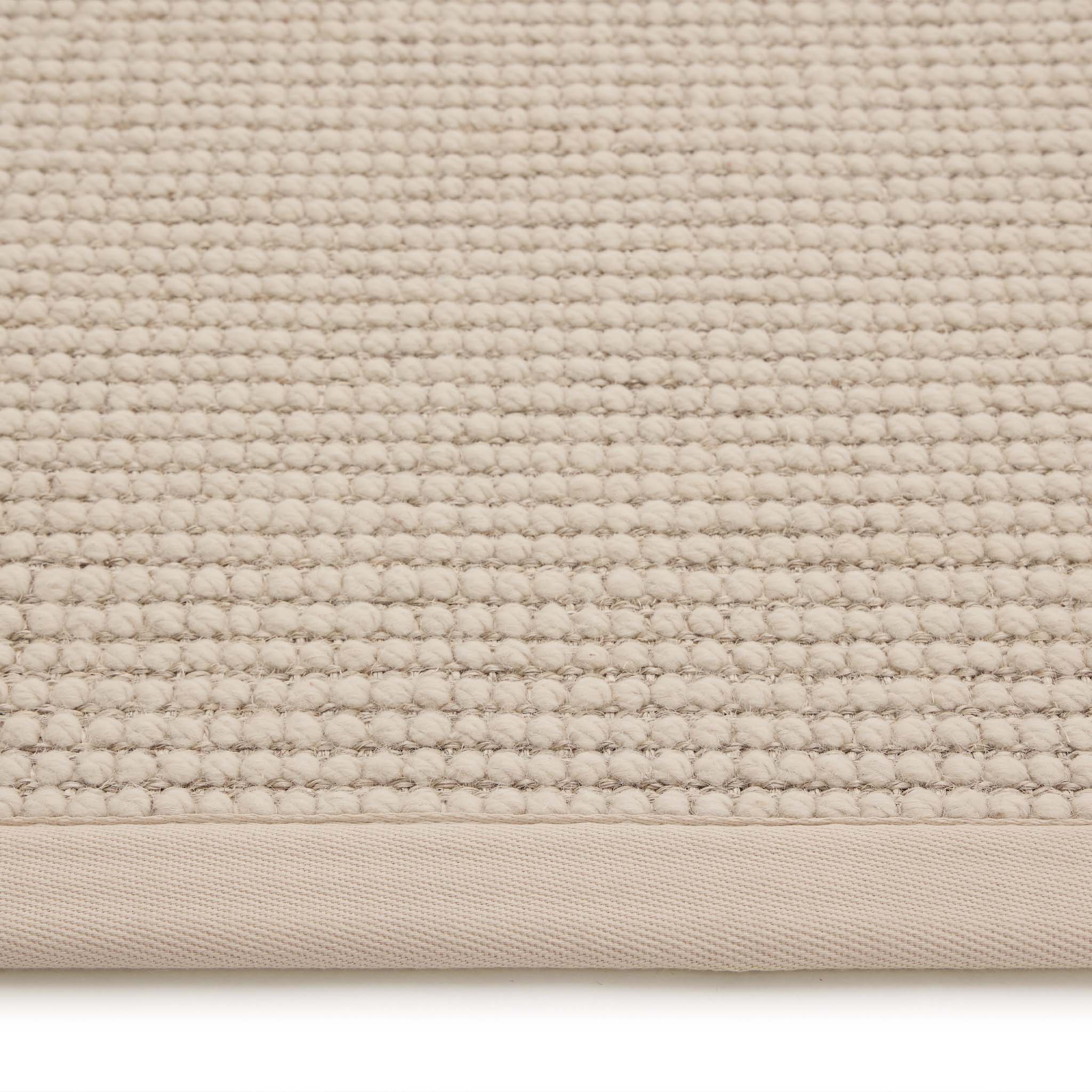 Origins Sisal Boucle with Beige Border- a wool rug featuring a natural border. 