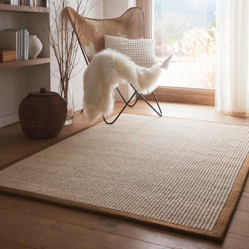 Origins Sisal Boucle with Mocha Border- made from sisal wool blend featuring a brown border.