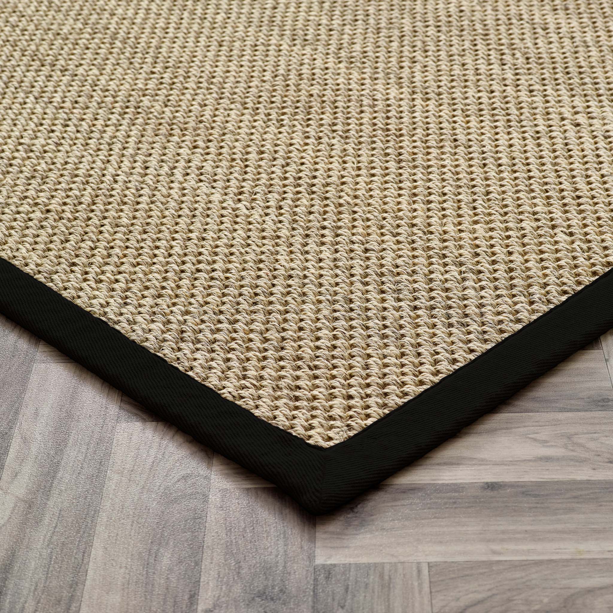 Origins Sisal Light Beige with Black Border- made from 100% sisal featuring a black border.