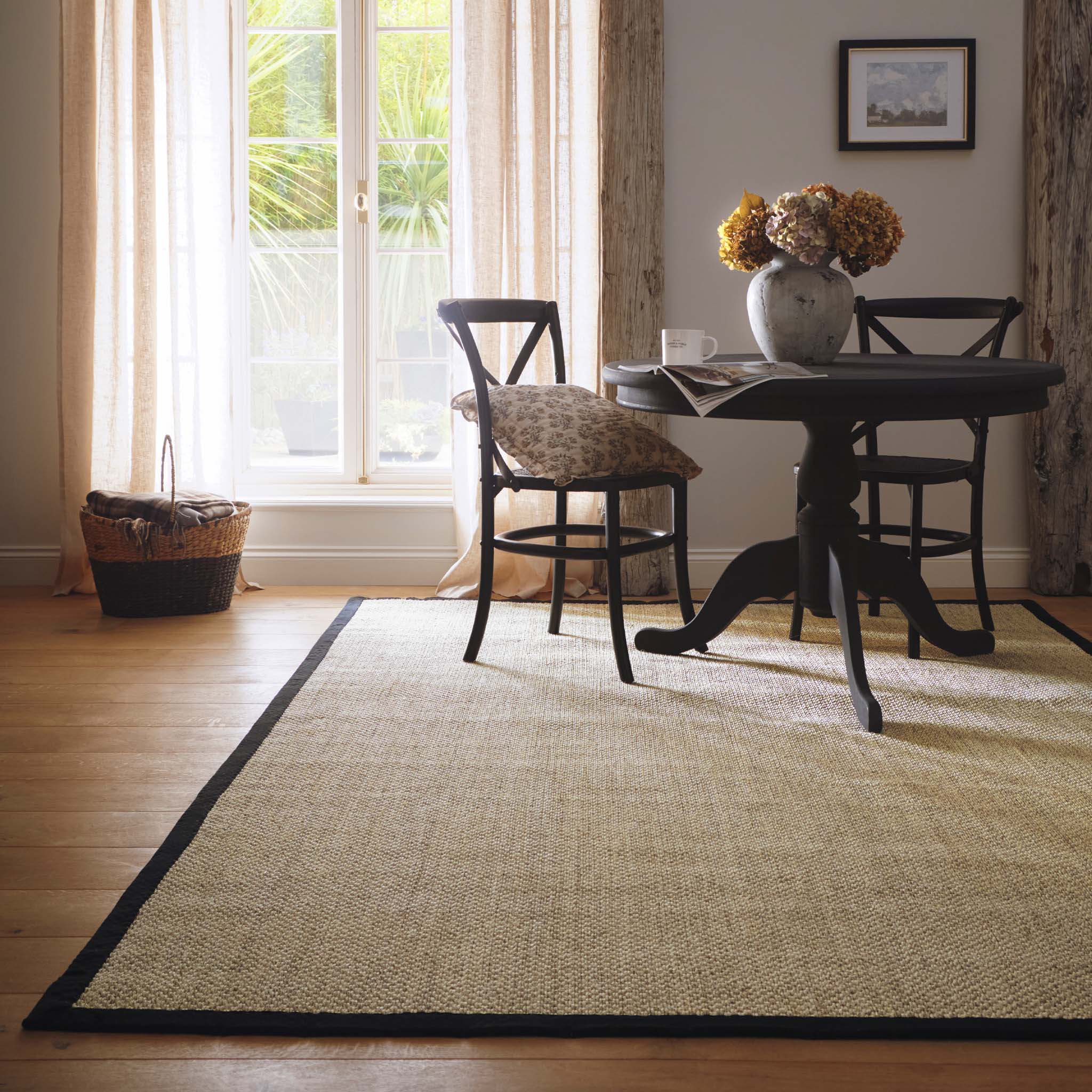Origins Sisal Light Beige with Black Border- made from 100% sisal featuring a black border.