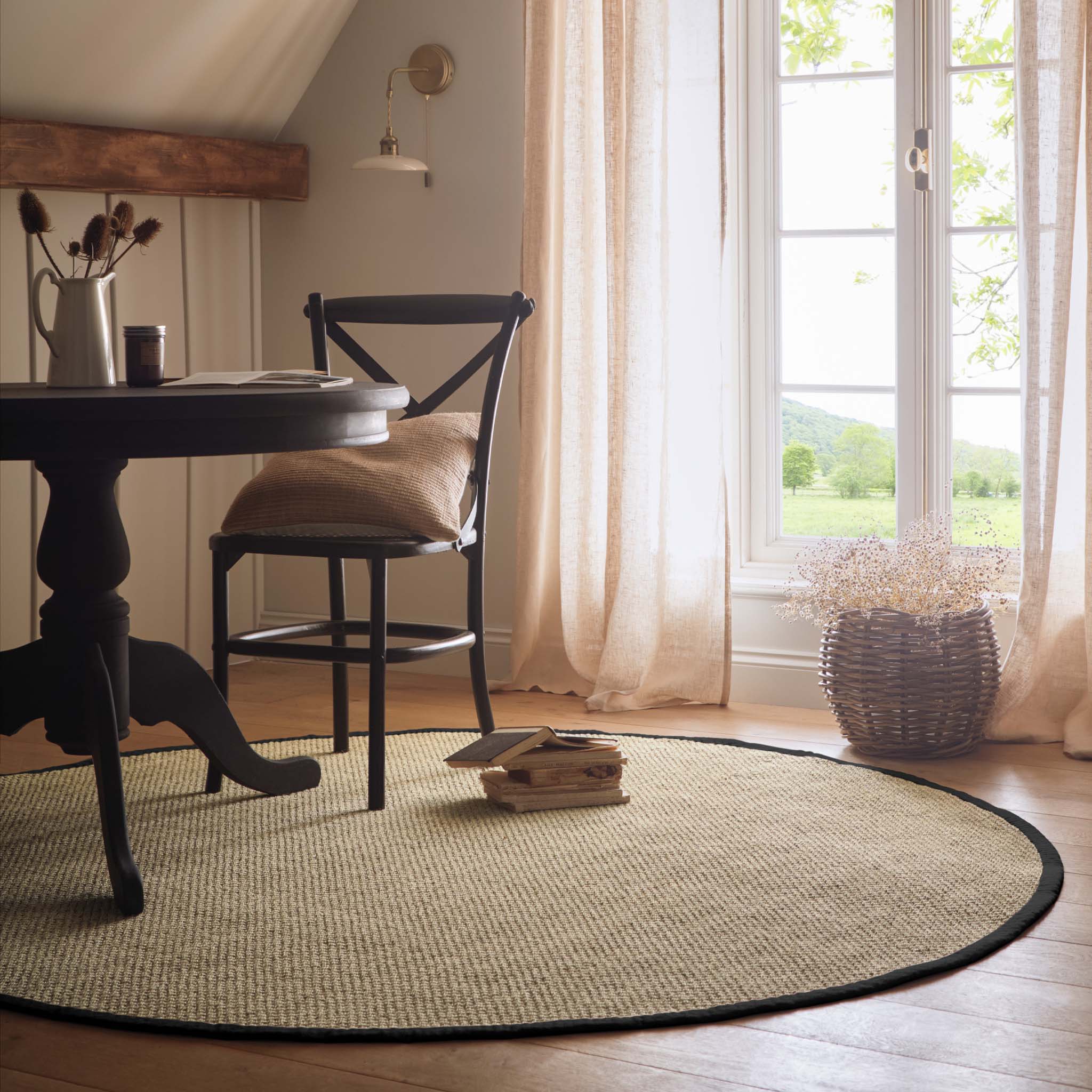 Origins Sisal Light Beige with Black Border- made from 100% sisal featuring a black border.
