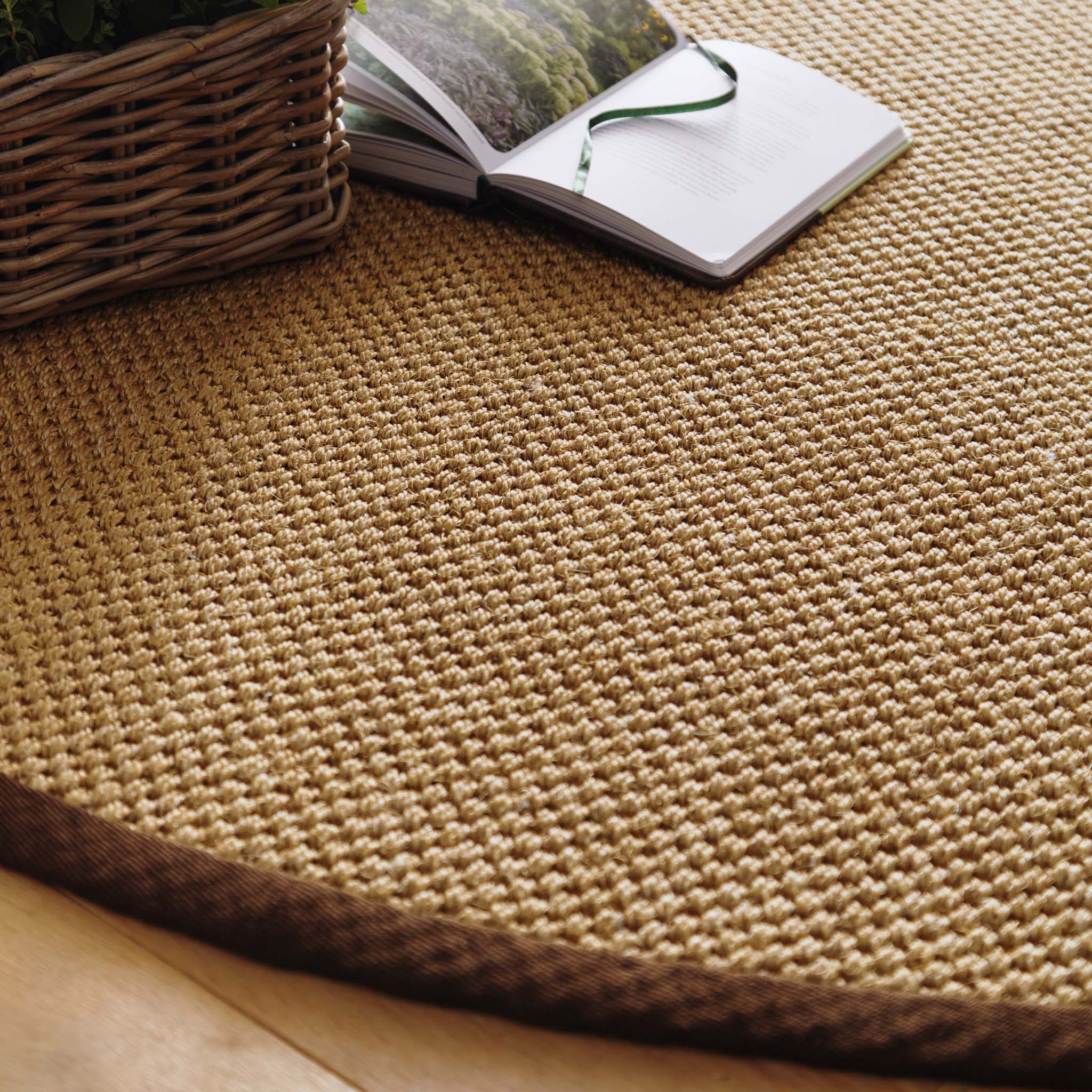 Origins Sisal Warm Natural with Dark Brown Border- a natural rug made from 100% sisal featuring a brown border.