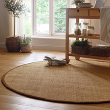 Load image into Gallery viewer, Origins Sisal Warm Natural with Dark Brown Border- a natural rug made from 100% sisal featuring a brown border.
